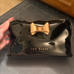 Ted Baker Black Patent Makeup Bag with Gold Bow Accent